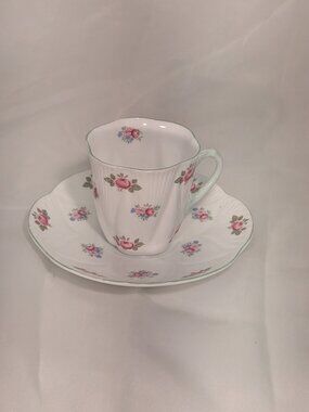 SHELLEY DEMITASSE CUP AND SAUCER IN THE  "ROSEBUD"  PATTERN  "DAINTY" SHAPE